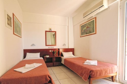 Twin room at Bellos Hotel Apartments in Crete, Greece. Travel with World Lifetime Journeys