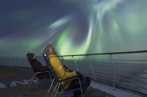 Watch the Northern Lights from deck on Norway Voyages. Travel with World Lifetime Journeys