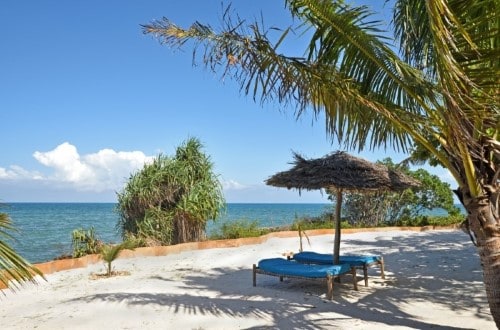 White sand beach at Fumba Beach Lodge, Zanzibar. Travel with World Lifetime Journeys