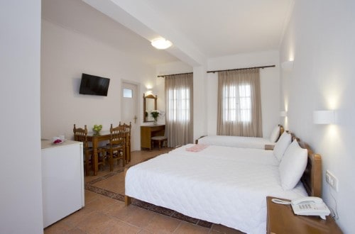 Family room at Alexandra Hotel in Santorini, Greece. Travel with World Lifetime Journeys
