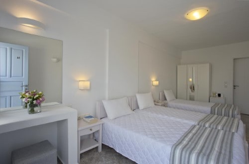 Family room at Alexandra Hotel in Santorini, Greece. Travel with World Lifetime Journeys