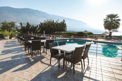 Outside terrace at Karavados Beach Hotel in Kefalonia Island, Greece. Travel with World Lifetime Journeys