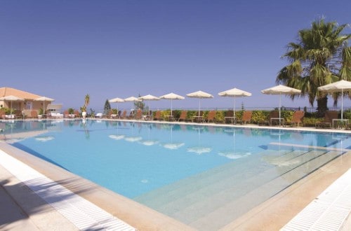 Pool side at Astra Village Hotel in Kefalonia, Greece. Travel with World Lifetime Journeys