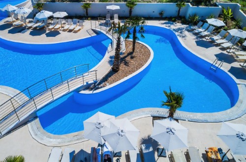 Pool side at Anna Hotel in Halkidiki, Greece. Travel with World Lifetime Journeys