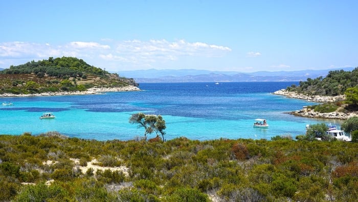 Turquoise waters in Halkidiki Peninsula in Greece. Travel with World Lifetime Journeys