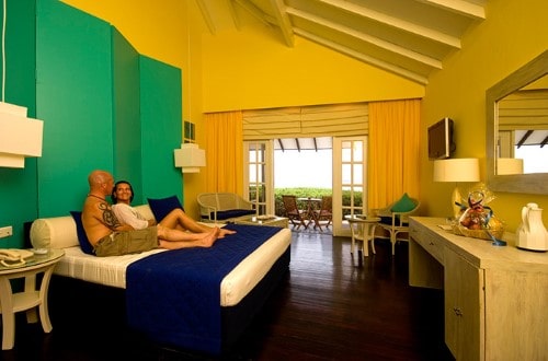 Bedroom at Adaaran Select Meedhupparu. Travel with World Lifetime Journeys