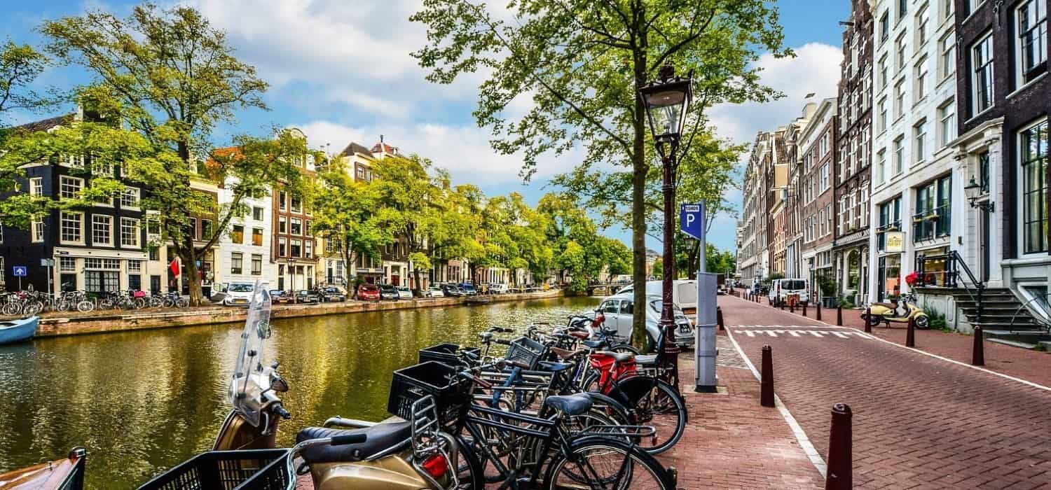 Bikes and canals in Amsterdam, Netherlands. Travel with World Lifetime Journeys