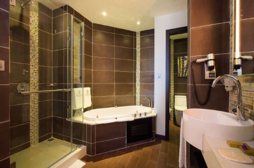 Comfort room bathroom at Maritim Crystals Beach. Travel with World Lifetime Journeys in Mauritius