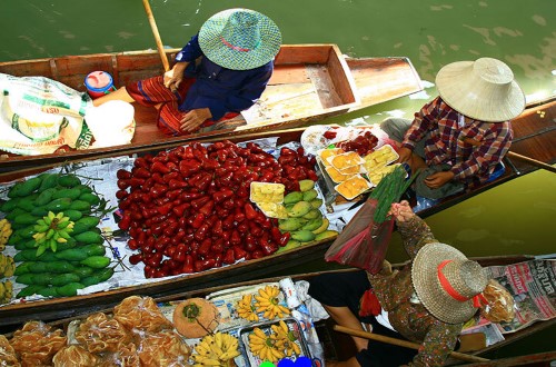 Floating Market in Thailand. Travel with World Lifetime Journeys