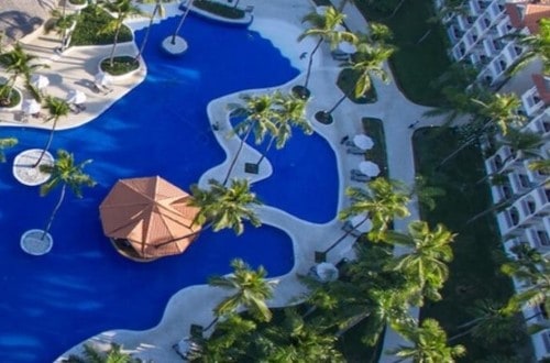 Pool view at Occidental Caribe. Travel with World Lifetime Journeys in Punta Cana, Dominican Republic