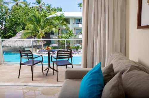 Premium Pool View room at Impressive Premium Resort Punta Cana. Travel with World Lifetime Journeys