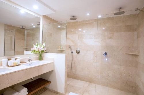 Premium Tropical View bathroom at Impressive Premium Resort Punta Cana. Travel with World Lifetime Journeys