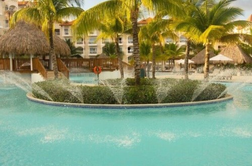 Swimming pool at Occidental Caribe. Travel with World Lifetime Journeys in Punta Cana, Dominican Republic