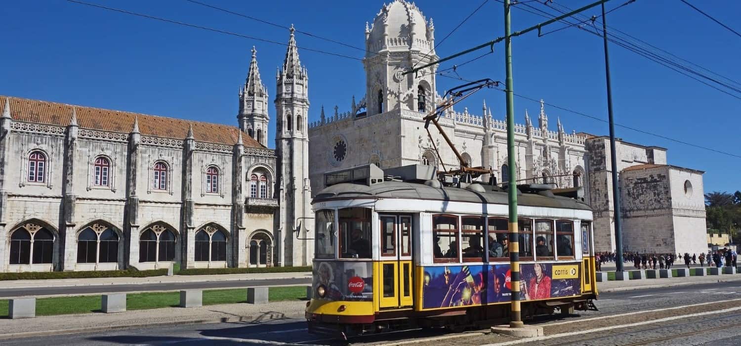 Tram and Mosteiro dos Jeronimos in Lisbon, Portugal. Travel with World Lifetime Journeys