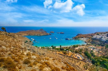 Lindos village and beach on Rhodes island. Travel with World Lifetime Journeys