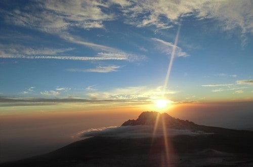 Sunrise on Kilimanjaro mountain. Travel with World Lifetime Journeys