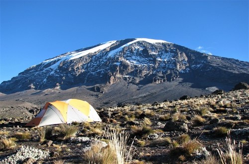 Tenting in Kilimanjaro mountain. Travel with World Lifetime Journeys