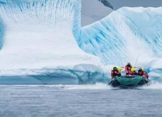 Antarctica Highlights of the Frozen Continent Excursion between the icebergs, Antarctica. Travel with World Lifetime Journeys