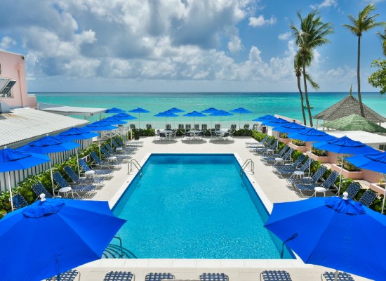 Main pool at Butterfly Beach Hotel Barbados. Travel with World Lifetime Journeys